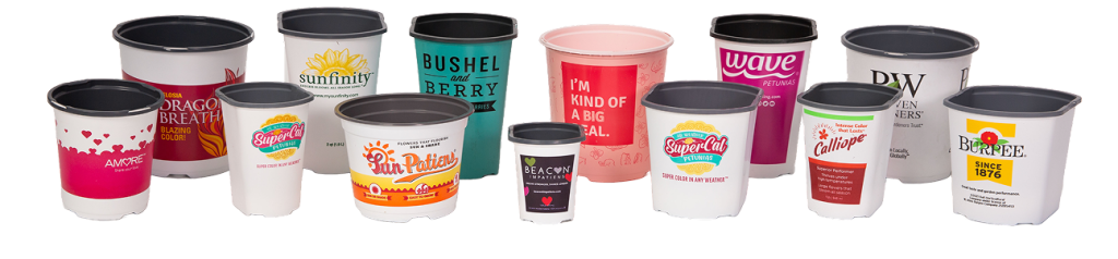 A wide variety of East Jordan Plastics pots with branding printed on them.